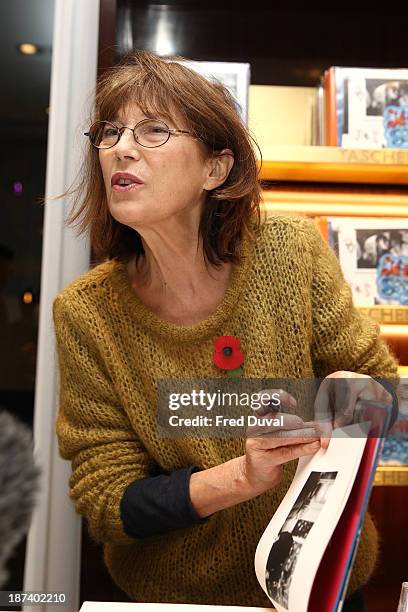 Jane Birkin sign copies of new book 'Jane & Serge' at Taschen Store on November 8, 2013 in London, England.