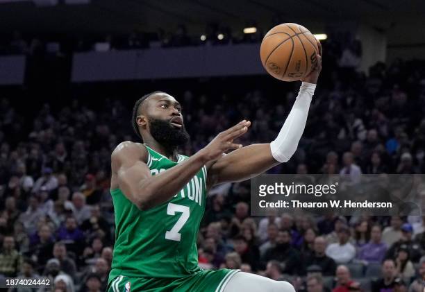 Jaylen Brown of the Boston Celtics driving to basket goes up for a layup against the Sacramento Kings during the first half of an NBA basketball game...