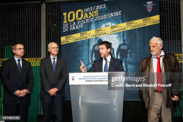 Head of Paris Judicial Police Christian Flaesch, Paris Prefect Bernard Boucault, French Interior Minister Manuel Valls and legendary actor Jean-Paul...