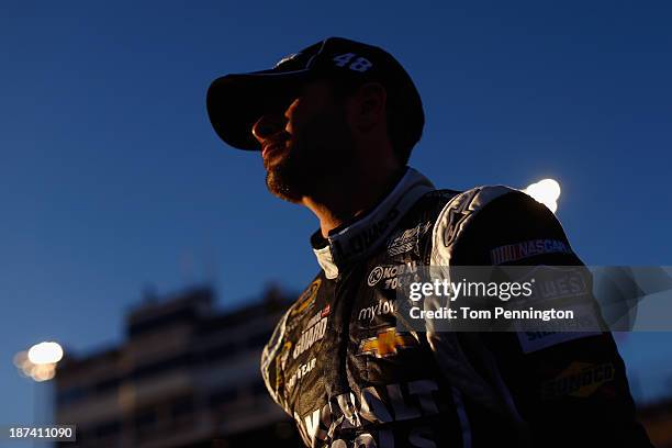 Jimmie Johnson, driver of the Lowe's/Kobalt Tools Chevrolet, looks on during qualifying for the NASCAR Sprint Cup Series Advocare 500 at Phoenix...