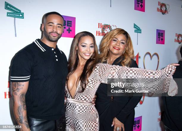 Anton Peeples, Erica Peeples and Anndera Peeples attend the red carpet for "Heart For The Holidays" LA Private Screening at The Landmark Westwood on...