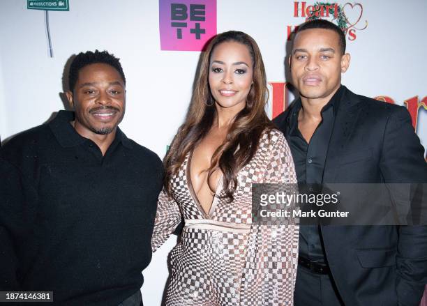 Kareem Grimes, Erica Peeples and Robert Ri'chard attend the red carpet for "Heart For The Holidays" LA Private Screening at The Landmark Westwood on...