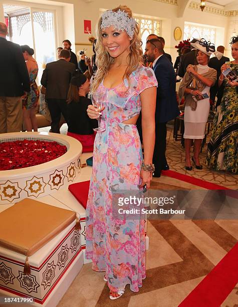 Charli Robinson attends the Emirates marquee during Stakes Day at Flemington Racecourse on November 9, 2013 in Melbourne, Australia.