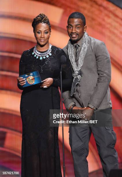 Actress Vivica A. Fox and actor/comedian Bill Bellamy speak onstage at the Soul Train Awards 2013 at the Orleans Arena on November 8, 2013 in Las...