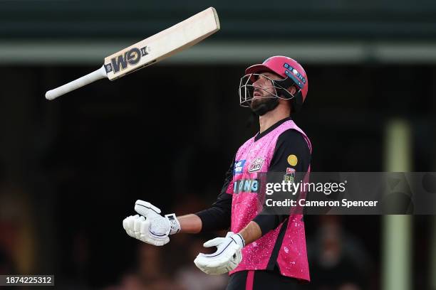 James Vince of the Sixers reacts after being dismissed by Jamie Overton of the Strikers during the BBL match between Sydney Sixers and Adelaide...