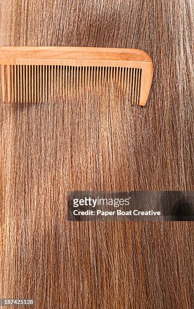 close up straight brunette hair being combed - comb stock pictures, royalty-free photos & images