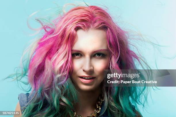 portrait of a woman with colorful hair dye - tangled stock pictures, royalty-free photos & images