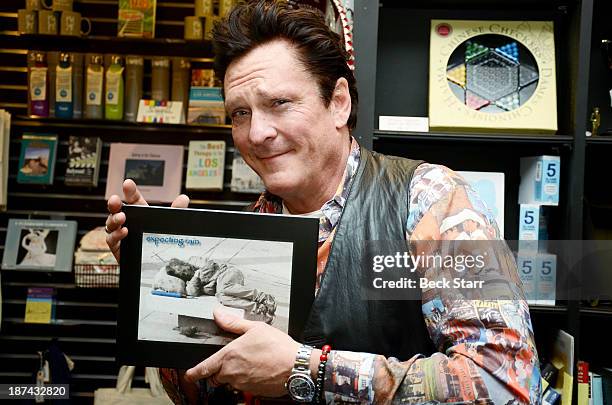 Actor/poet Michael Madsen signs copies of his new book "Expecting Rain" at Book Soup on November 8, 2013 in West Hollywood, California.