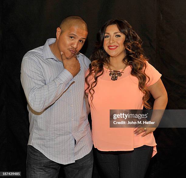 Two time world champion boxer Fernando Vargas and his wife Martha Lopez Vargas pose for pictures at the Getty Images offices on November 8, 2013 in...