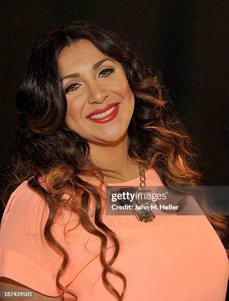 Martha Lopez Vargas poses for pictures at the Getty Images offices on November 8, 2013 in Los Angeles, California.
