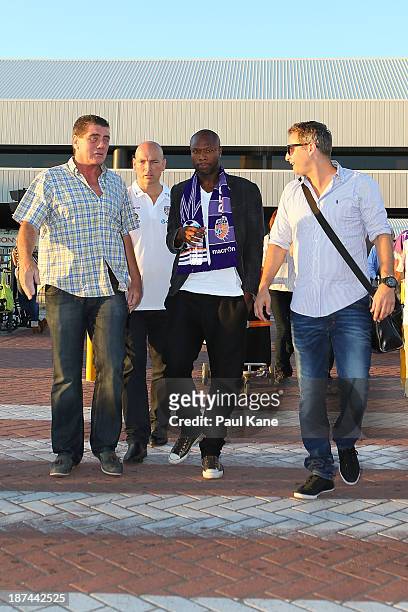 New Perth Glory A-League recruit William Gallas walks to his waiting car after arriving at Perth International Airport on November 9, 2013 in Perth,...