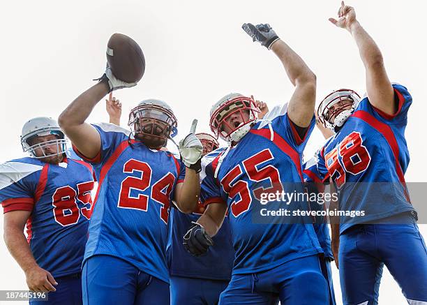 football team - american football player celebrating stock pictures, royalty-free photos & images