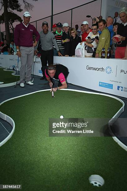 Miguel Angel Jimenez of Spain takes part in the Genworth Putts4Charity Challenge Series Final after the second round of the Turkish Airlines Open at...