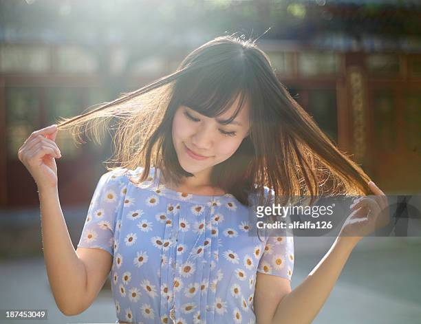 dancing hair - floral pattern dress stock pictures, royalty-free photos & images