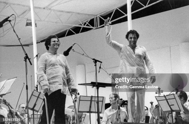 Indian conductor Zubin Mehta and Israeli-American violinist Itzhak Perlman in concert, circa 1990.