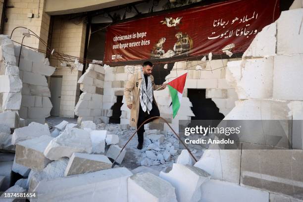 Model of a demolished room was placed in front of the Ramallah Municipality to show solidarity with Gazan people in Ramallah, West Bank on December...