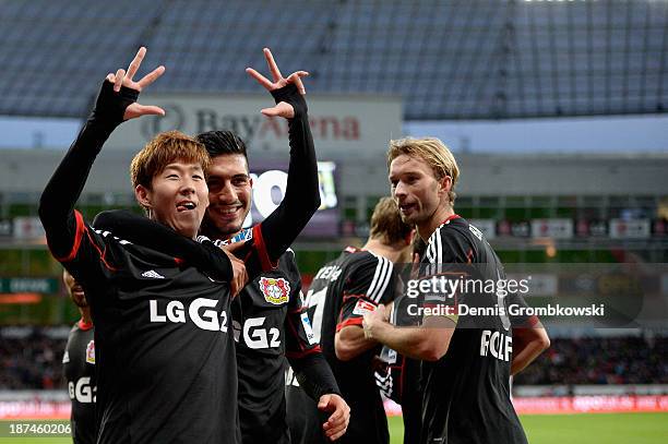 Heung-Min Son of Bayer Leverkusen celebrates his third goal during the Bundesliga match between Bayer Leverkusen and Hamburger SV at BayArena on...