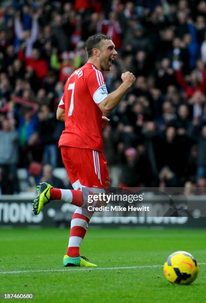 Rickie Lambert of Southampton celebrates as he scores their second goal from a penalty kick during the Barclays Premier League match between...