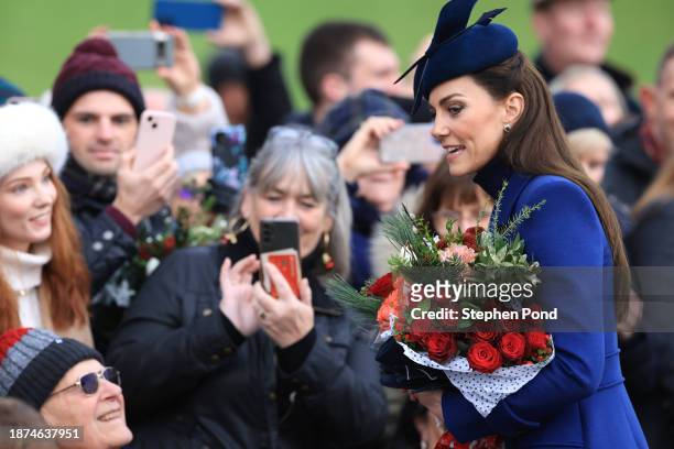 Catherine, Princess of Wales greets well-wishers after attending the Christmas Morning Service at Sandringham Church on December 25, 2023 in...