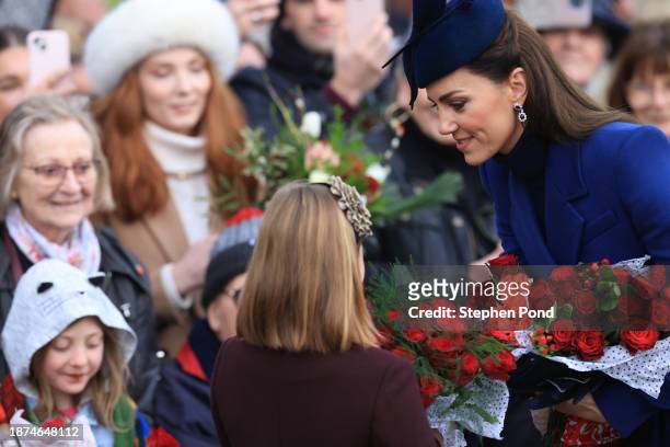 Catherine, Princess of Wales and Mia Tindall greet well-wishers after attending the Christmas Morning Service at Sandringham Church on December 25,...