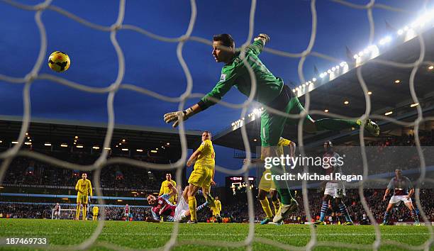 Libor Kozak of Aston Villa scores his team's second goal past goalkeeper David Marshall of Cardiff during the Barclays Premier League match between...