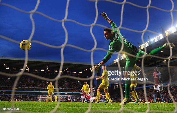 Libor Kozak of Aston Villa scores his team's second goal past goalkeeper David Marshall of Cardiff during the Barclays Premier League match between...