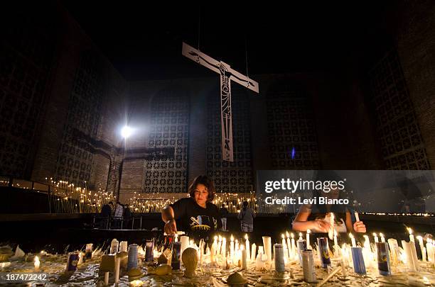 Milhares de fiéis vão ao Santuário de Nossa Senhora de Aparecida para acompanhar as celebrações do Dia da Padroeira do Brasil. | Thousands of...