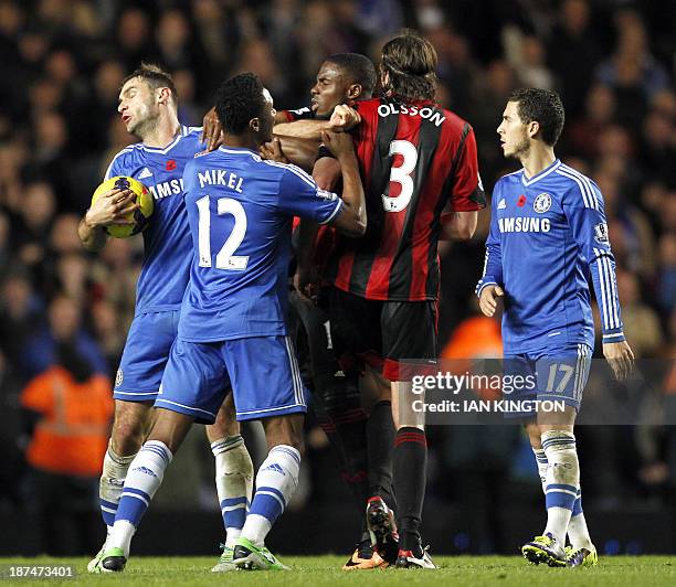 West Bromwich Albion's Swedish defender Jonas Olsson and Chelsea's Serbian defender Branislav Ivanovic confront each other during the English Premier...