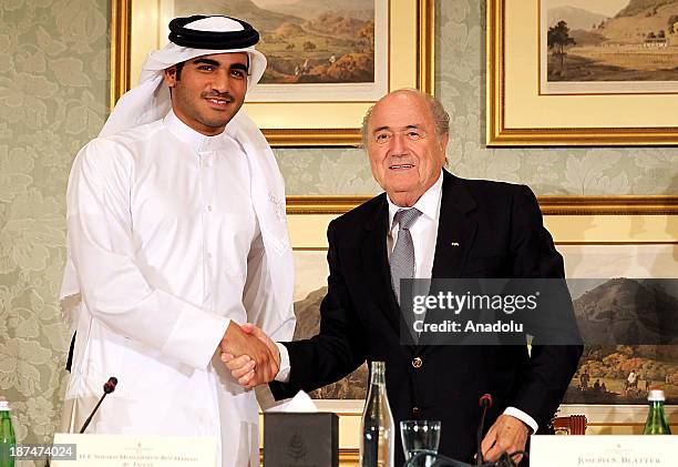 President Sepp Blatter and the Chairman of Qatar 2022 bid committee Sheik Mohammed bin Hamad al-Thani hold a press conference on November 9, 2013 in...