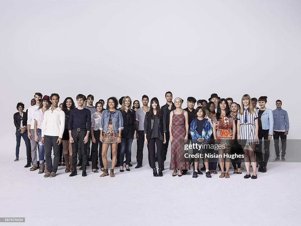 Large Group of people standing together in studio