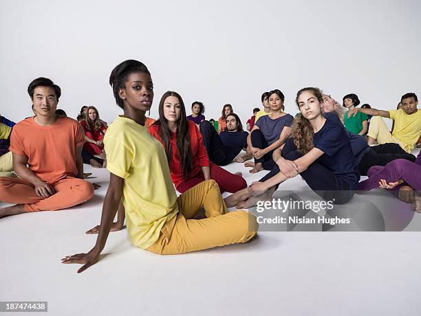 studio shot of a large diverse group of people - group studio shot stock pictures, royalty-free photos & images