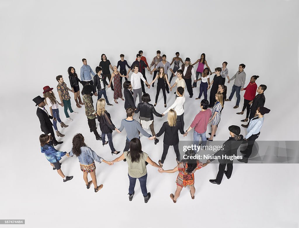 Large Group of people standing in circles