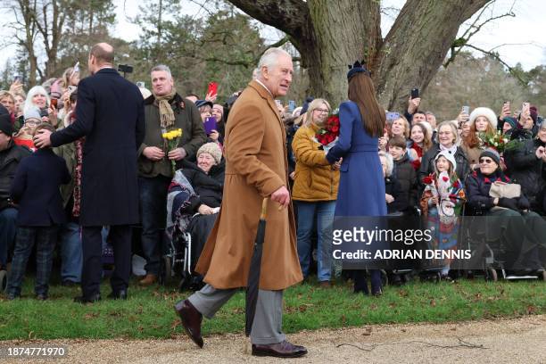 Britain's King Charles III leaves after attending the Royal Family's traditional Christmas Day service at St Mary Magdalene Church in Sandringham in...