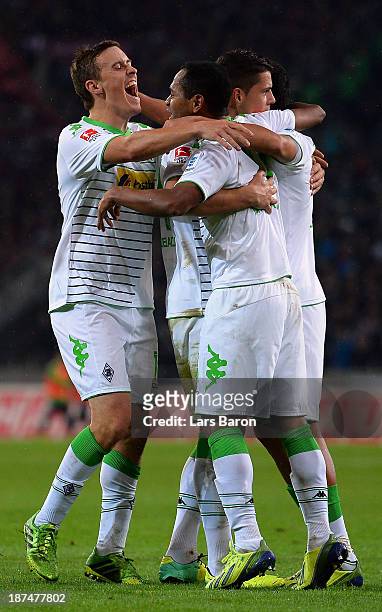 Juan Arango of Moenchengladbach celebrates with team mates after their second goal during the Bundesliga match between Borussia Moenchengladbach and...