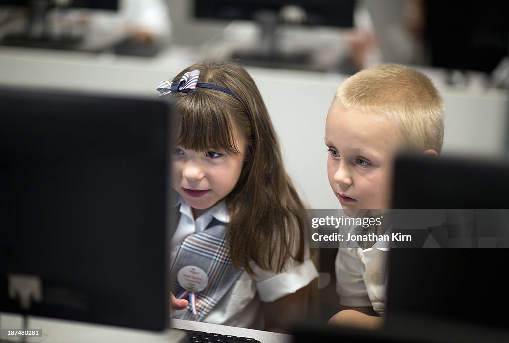 First Grade School Children Learn On Computers High-Res Stock Photo ...