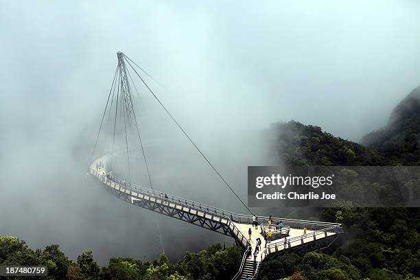 left to hang, high & misty... - langkawi stock-fotos und bilder