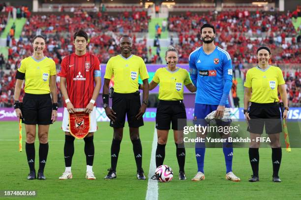 Referee Tori Penso poses for a photo alongside Hiroki Sakai of Urawa Reds and Mohamed Elshenawy of Al Ahly FC prior to the FIFA Club World Cup Saudi...