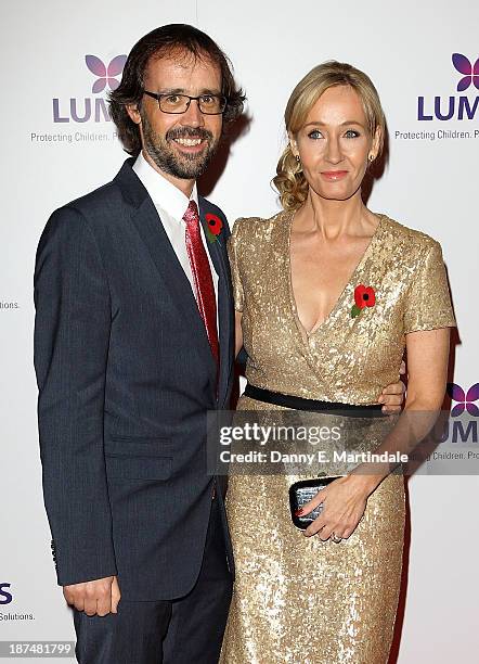 Joanne "JK" Rowling and Dr Neil Murray attend a charity evening hosted by JK Rowling to raise funds for 'Lumos' a charity helping to reunite children...