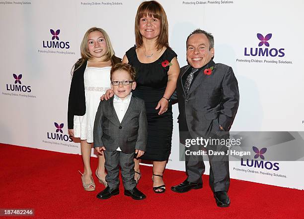 Warwick Davis and family attend a charity evening hosted by JK Rowling to raise funds for 'Lumos' a charity helping to reunite children in care with...