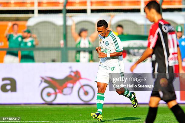 Juninho of Palmeiras celebrates after scoring goal during the match between Palmeiras and Joinville for the Brazilian Series B 2013 on November 09,...