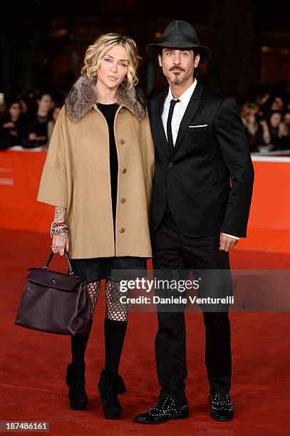 Paola Barale and Raz Degan attend the 'Dallas Buyers Club' Premiere during The 8th Rome Film Festival on November 9, 2013 in Rome, Italy.