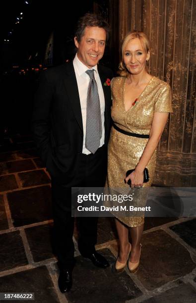 Hugh Grant and J.K. Rowling attend the Lumos fundraising event hosted by J.K. Rowling at The Warner Bros. Harry Potter Tour on November 9, 2013 in...