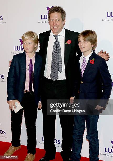 Hugh Grant and Damian Hurley attend a charity evening hosted by JK Rowling to raise funds for 'Lumos' a charity helping to reunite children in care...