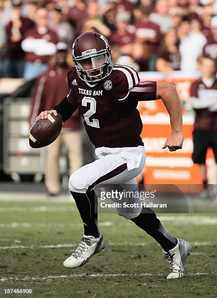 Johnny Manziel of the Texas A&M Aggies drops back to pass in the first half during the game against the Mississippi State Bulldogs at Kyle Field on...