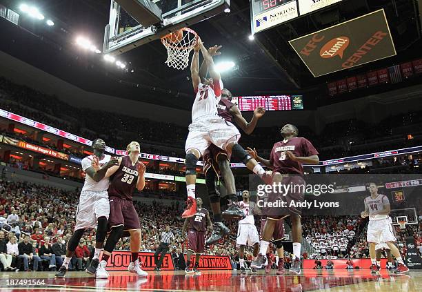 Wayne Blackshear of the Louisville Cardinals dunks the ball during the game against the College of Charleston Cougars at KFC YUM! Center on November...