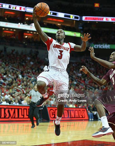 Chris Jones of the Louisville Cardinals shoots the ball during the game against the College of Charleston Cougars at KFC YUM! Center on November 9,...