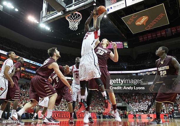 Mangok Mathiang of the Louisville Cardinals shoots the ball during the game against the College of Charleston Cougars at KFC YUM! Center on November...