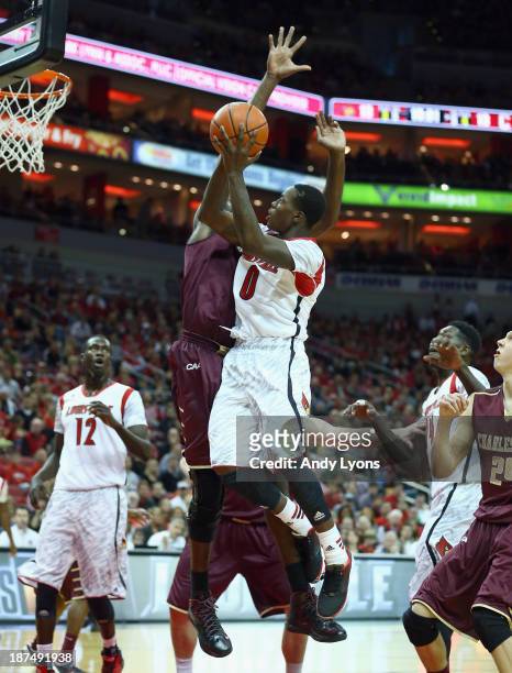 Terry Rozier of the Louisville Cardinals shoots the ball during the game against the College of Charleston Cougars at KFC YUM! Center on November 9,...