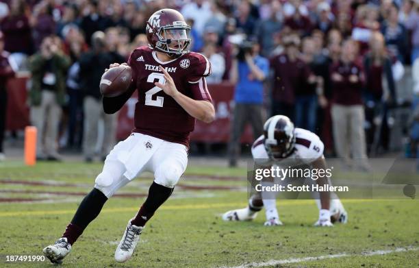 Johnny Manziel of the Texas A&M Aggies drops back to pass in the first half during the game against the Mississippi State Bulldogs at Kyle Field on...