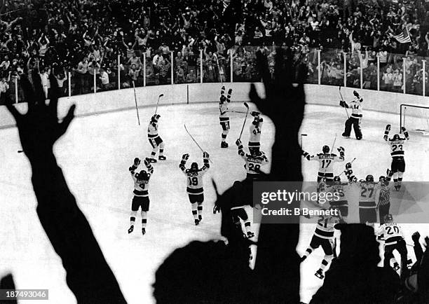 Team USA celebrates their 4-3 victory over the Soviet Union in the first final round Men's Ice Hockey event at the 1980 Winter Olympic Games in Lake...